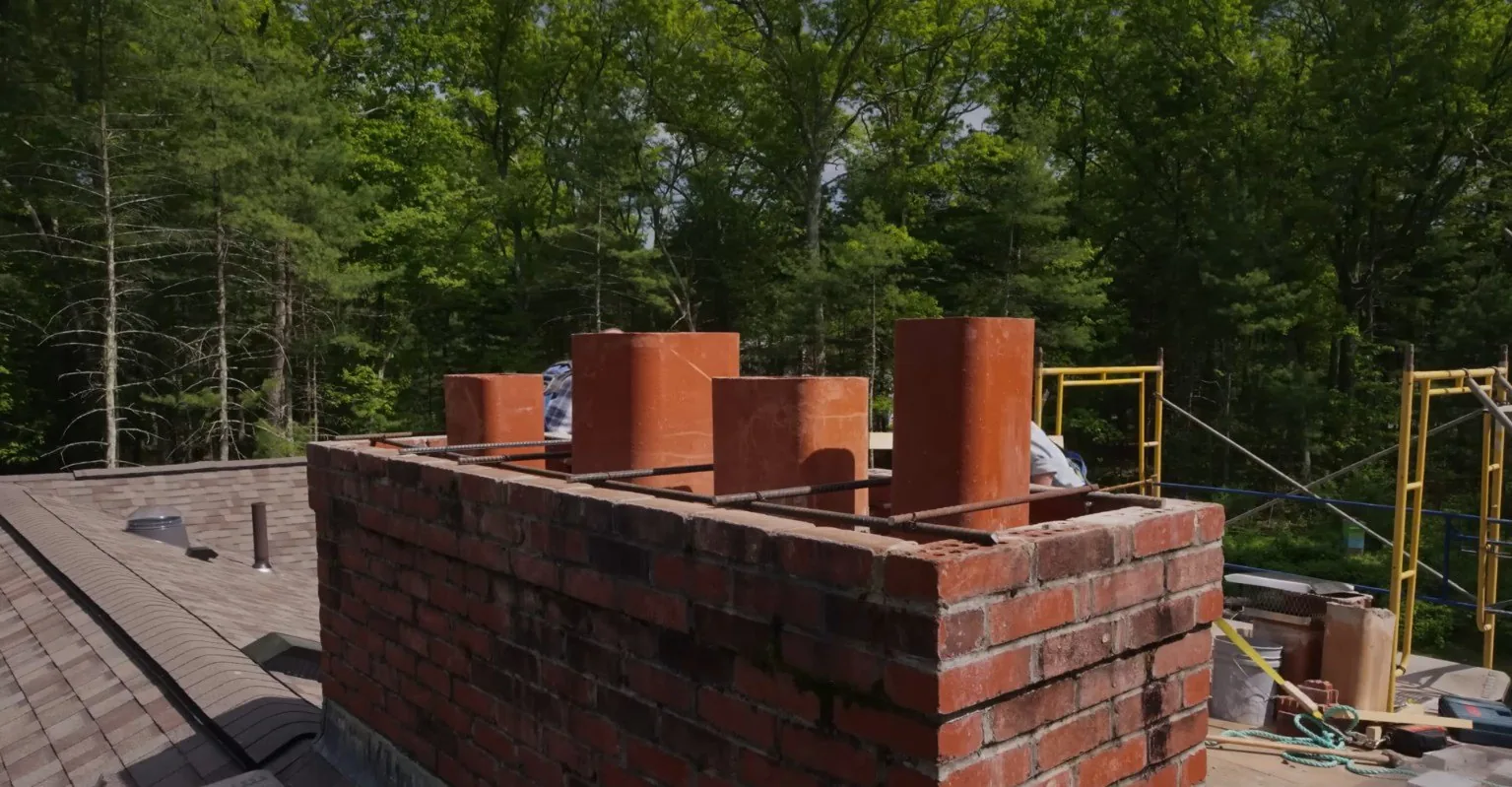 Chimney with new flue tiles ready for a crown