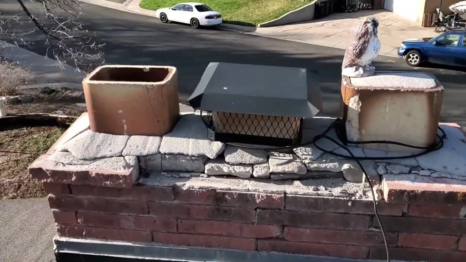 Deteriorated chimney crown with a capped flue